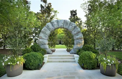 Sculptural entrance with Buxus